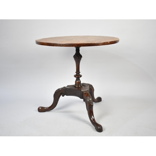 558 - A Circular Tripod Table, Victorian Base but Later Top, 62cms Diameter