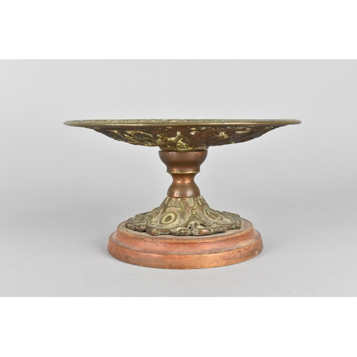 63 - A Pierced Gilt Metal Stand in the Coalbrookdale Style on Later Turned Wooden Plinth, 18.5cms Diamete... 