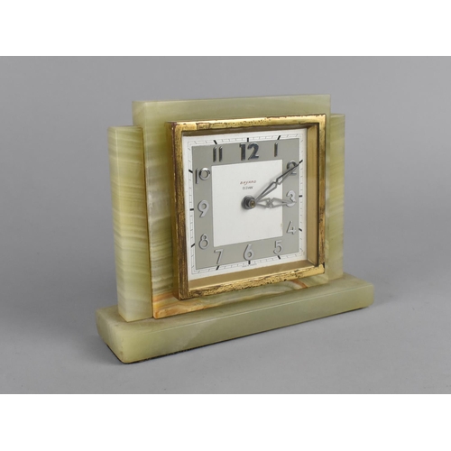 65 - An Art Deco Onyx and Brass Mantel Clock by Bayard, Eight Day Movement, 16cms Wide, Working Order