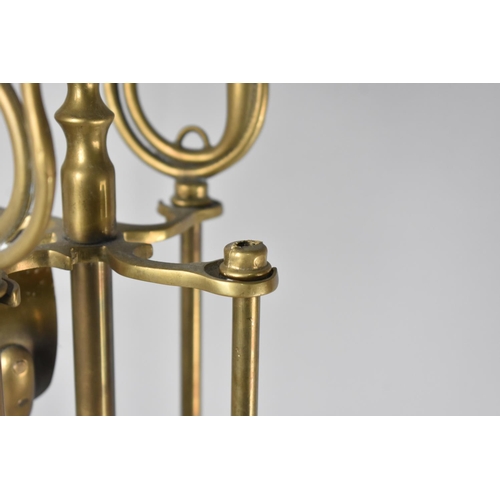 80 - An Mid 20th Century Brass Long Handled Fire Companion Set, Handles in the Form of Tubas, One AF, 77c... 