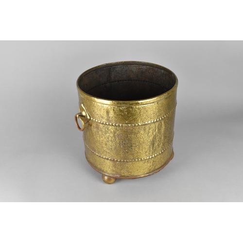 81 - A Mid 20th century Brass Coal Bucket with Three Ball Feet and Ring Carrying Handles, 27.5cms Diamete... 