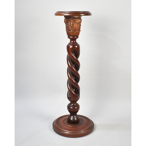 84 - A Victorian Style Mahogany Barley Twist Torchere Stand with Circular Top, 96cms High