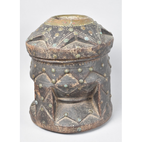 85 - An Arabic Mortar Carved From Tree Trunk with Geometric Pattern Decoration with Copper and Brass Stud... 