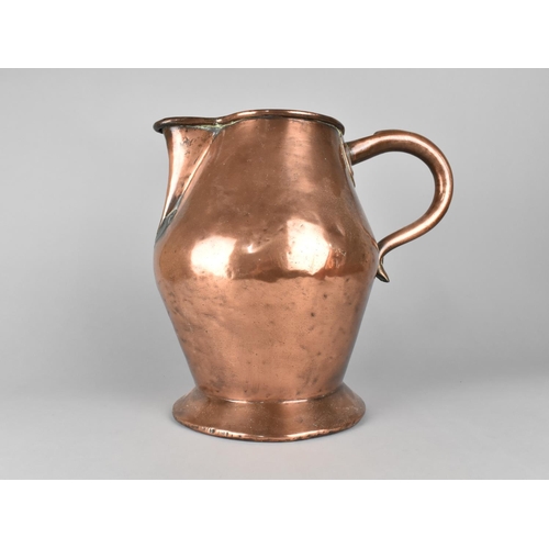 88 - A Heavy and Large 19th Century Copper Jug, 30cms High