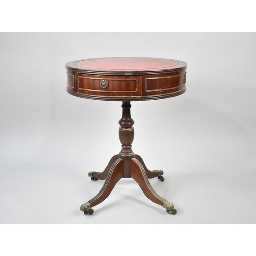 94 - A Reproduction Mahogany Drum Table with Tooled Leather Top, 48.5cms Wide