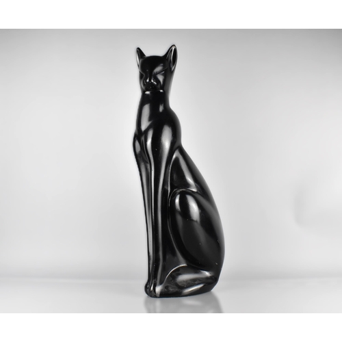 458 - A Large Art Deco Black Painted Plaster Study of a Seated Cat, 59cm High