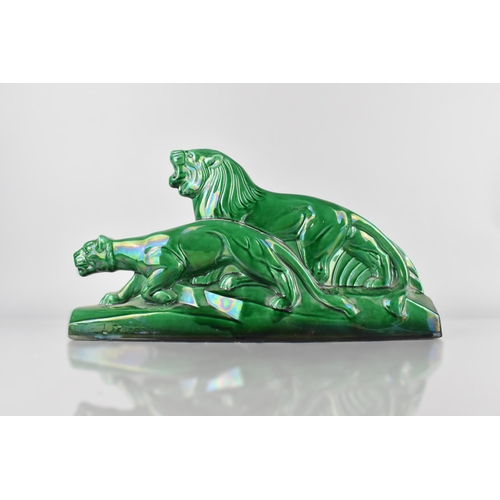 459 - An Art Deco Green Lustre Ceramic Study of Lions on Rectangular Base. After L. François,