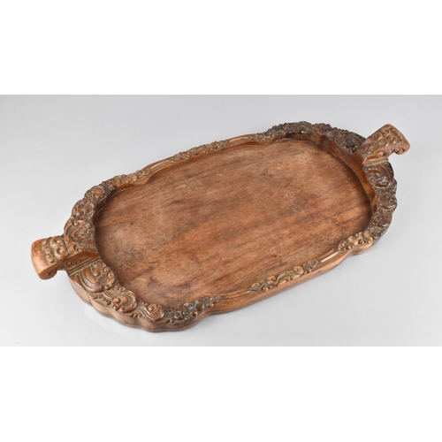 114 - A Chinese Late Qing Dynasty Hardwood Tray with Carved Galleried Sides and Twin Handles, 51cm Wide