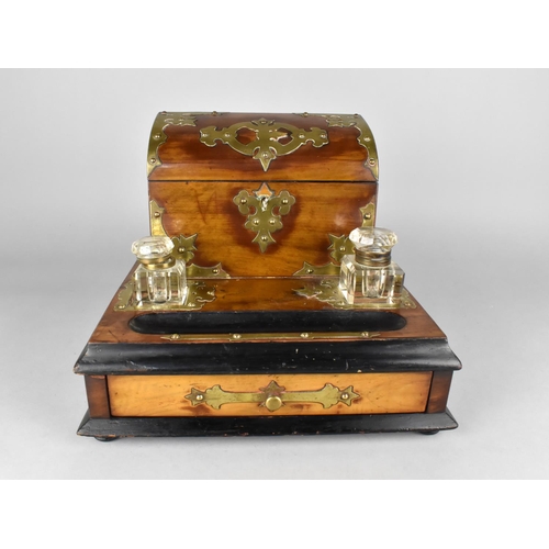 10 - A Late Victorian Brass Mounted Walnut Desktop Inkstand with Base Drawer, Pen Rest Trough, Two Glass ... 