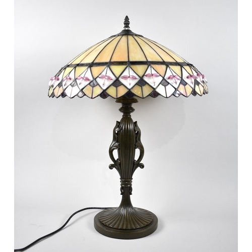 102 - A Reproduction Bronze Effect Table Lamp with Tiffany Style Shade, 60cms High