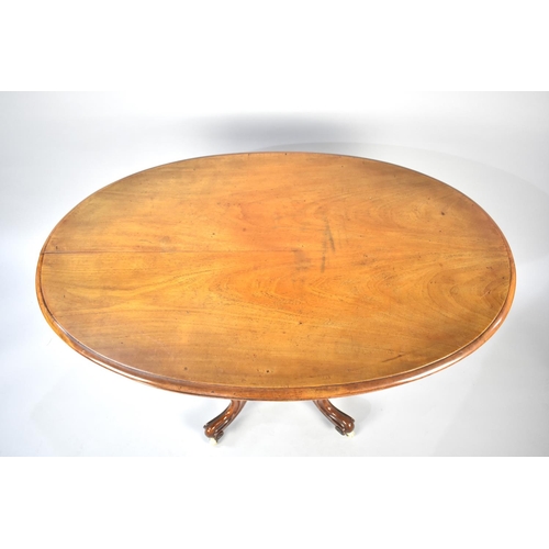 103 - A Victorian Oval Topped Occasional Table with Extended Birdcage Supports and Scrolled Seat Culminati... 