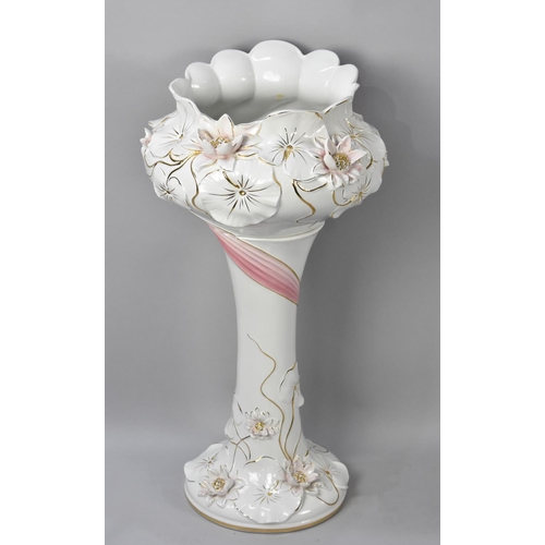 110 - A Modern Continental Ceramic Jardiniere on Stand with Relief Lily Decoration