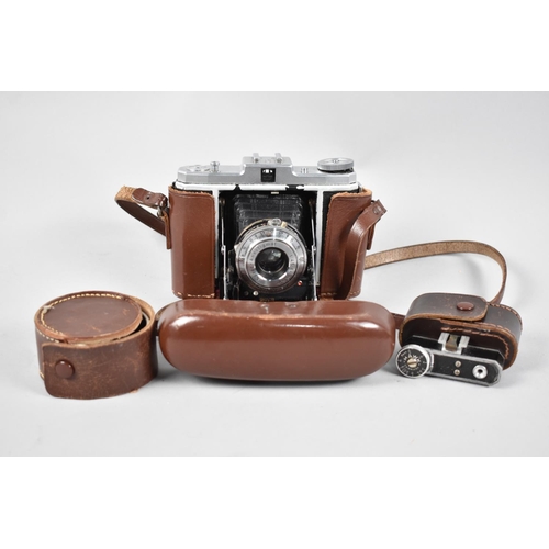 113 - A Vintage Nettar Zeiss Ikon Camera with Accessories