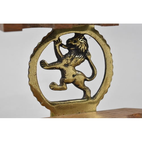 119 - A Vintage Pipe Rack with Horse Brass Mount and Containing Three Vintage Pipes