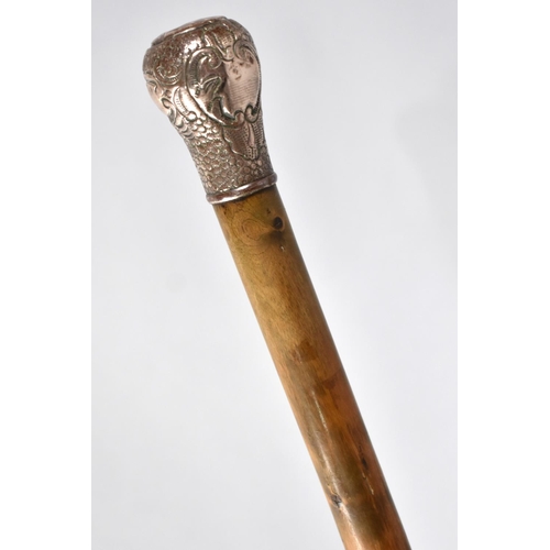 12 - A Late 19th/Early 20th Century Walking Cane with Engraved Silver Plate Mounted Top