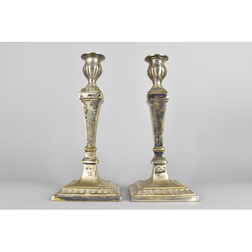 121 - A Pair of Silver Plated Brass Candlesticks , 25.5cms High