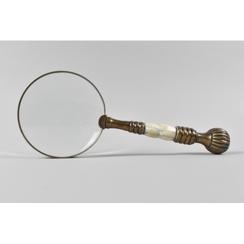 25 - A Modern Brass and Mother of Pearl Handled Desktop Magnifying Glass, 25.5cms Long