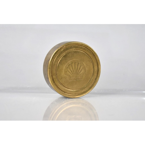 28 - A Modern Brass Circular Paperweight Stamped with the Shell Oil Logo, 5.5cms Diameter