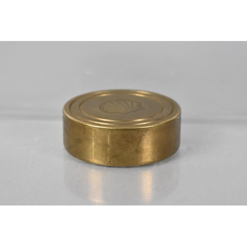 28 - A Modern Brass Circular Paperweight Stamped with the Shell Oil Logo, 5.5cms Diameter