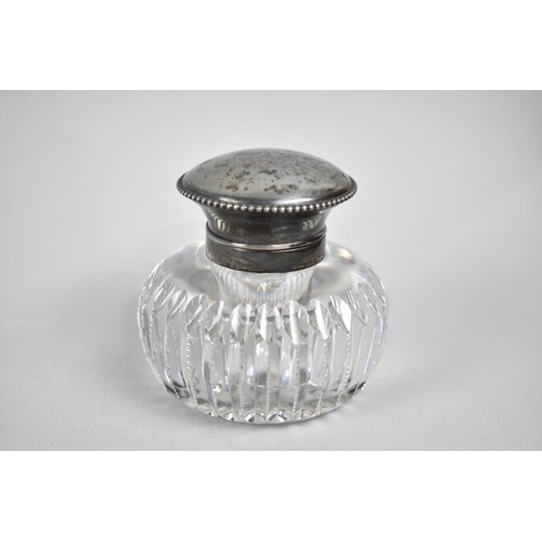 38 - A Circular Glass Desktop Inkwell with Sterling Silver Hinged Lid and Collar, 8.5cms High