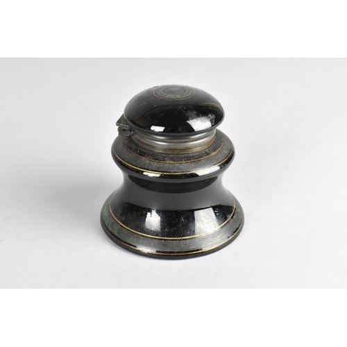 39 - A 19th Century Black and Green Enamelled Capstan Style Ceramic Inkwell, 8cms High