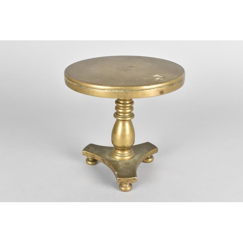 43 - A 19th Century Heavy Bronze Novelty Candle Reflector in the Form of a Snap Top Tripod Table, 13cms D... 