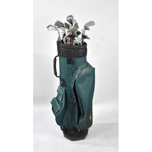 541 - A Mid/Late 20th Century Golf Bag Containing Various Slazenger, Dunlop and Other Golfing Irons, Putte... 