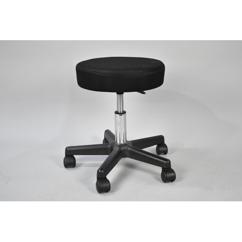 556 - A Modern Height Adjusting Circular Stool on Castors