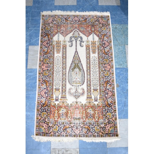 558 - A Patterned Cotton and Silk Rug, 156x92cms