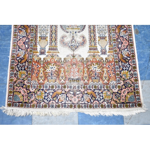 558 - A Patterned Cotton and Silk Rug, 156x92cms