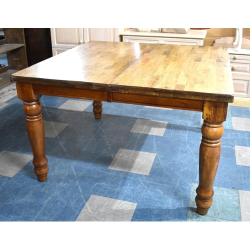 566 - A Mid 20th Century Extending Rectangular Dining Table, 168cms by 122cms