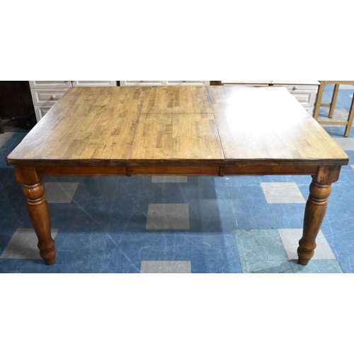 566 - A Mid 20th Century Extending Rectangular Dining Table, 168cms by 122cms