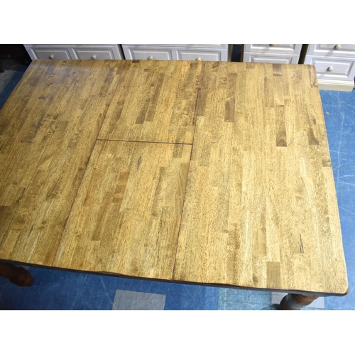 566 - A Mid 20th Century Extending Rectangular Dining Table, 168cms by 122cms