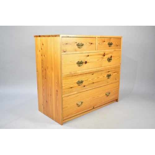 570 - A Pine Bedroom Chest of Two Short and Three Long Drawers with Brass Drop Handles, 91cms Wide