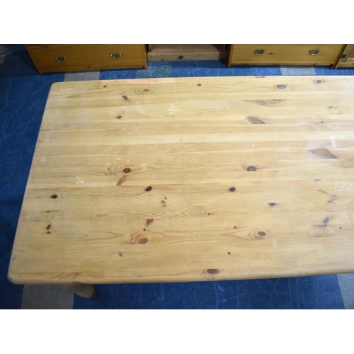 574 - A Mid/Late 20th Century Rectangular Pine Kitchen Table, 179cms by 91cms