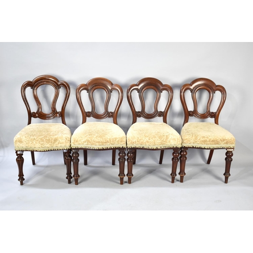 590 - A Set of Four Late Victorian Mahogany Framed Balloon backed Side Chairs