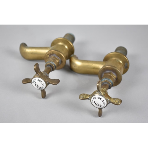 64 - A Pair of Vintage Brass Taps with Enamelled Disc for HE Rudge and Co, 1901, 19cms High Overall