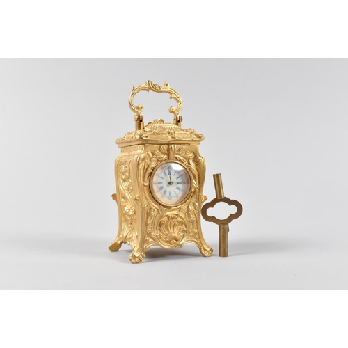 68 - A Reproduction French Style Gilt Ormolu Miniature Carriage Clock in the Rococo Taste, Enamelled Dial... 