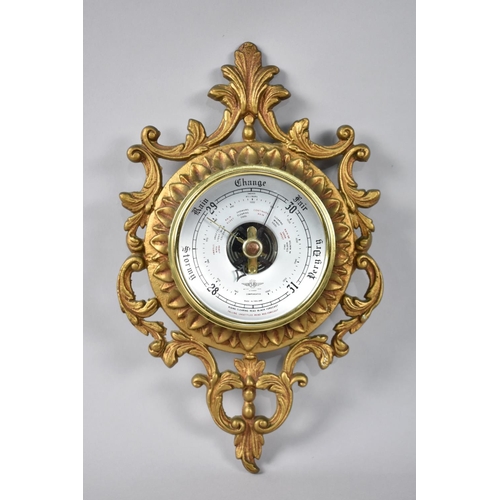 78 - A Gilt Metal Framed Wall Hanging Aneroid Barometer, 30cms High