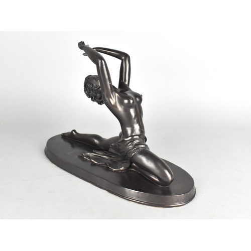 90 - A Modern Resin Bronze Effect Figure of a Dancing Nude, Oval Base, 30cms Long