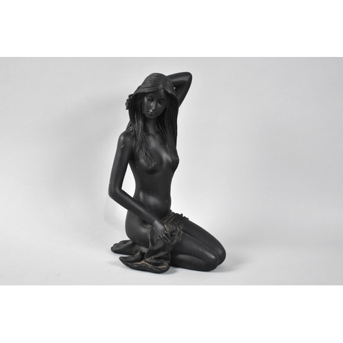 91 - A Late 20th Century Resin Figure of Kneeling Nude, 23cms High