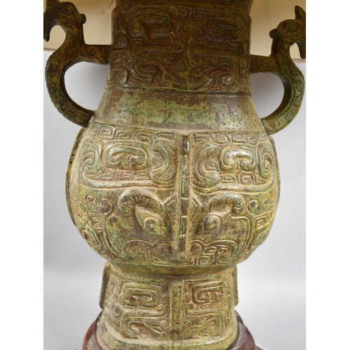 102 - A Large Oriental Style Ceramic Table Lamp in the Form of an Archaic Two Handled Vase, Complete with ... 