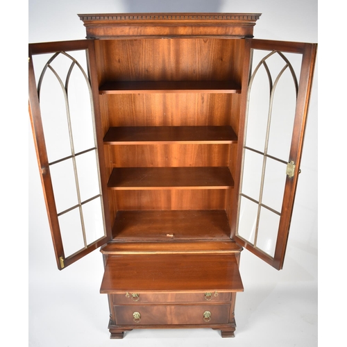 108 - A Modern Mahogany Three Shelf Glazed Bookcase on Base with three Long Drawers and Brushing Slide, Br... 