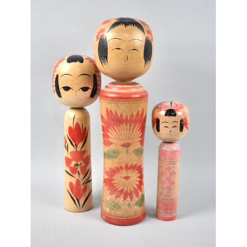 115 - A Set of Three Graduated Chinese Kokeshi Dolls, Largest 36.5cms High