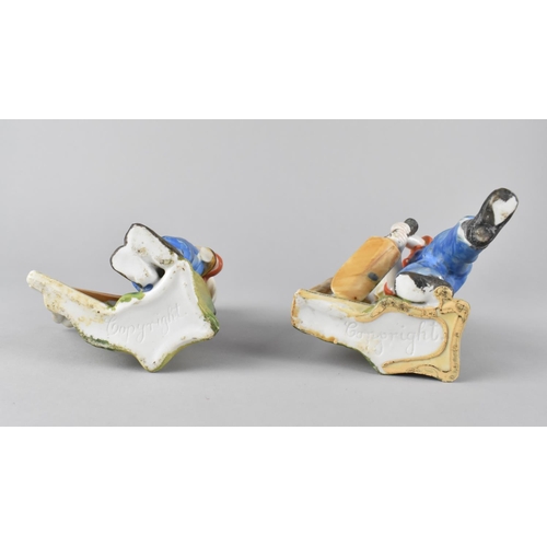 118 - A Pair of Cold Painted Bisque Spill Vases in the Form Of Young boy Playing Cricket, 