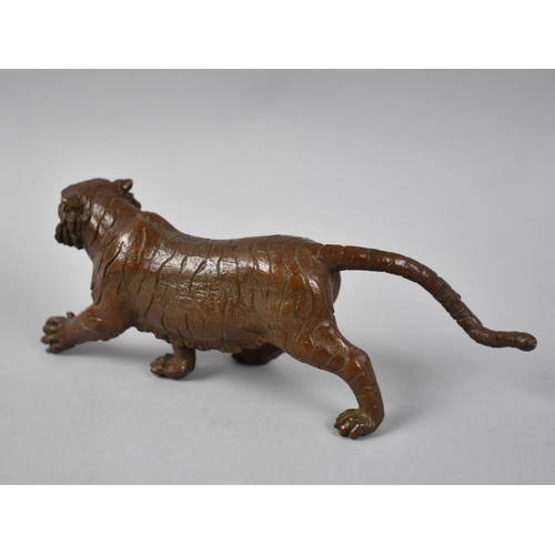 125 - A Patinated Bronze Study of a Tiger, 15cms Long