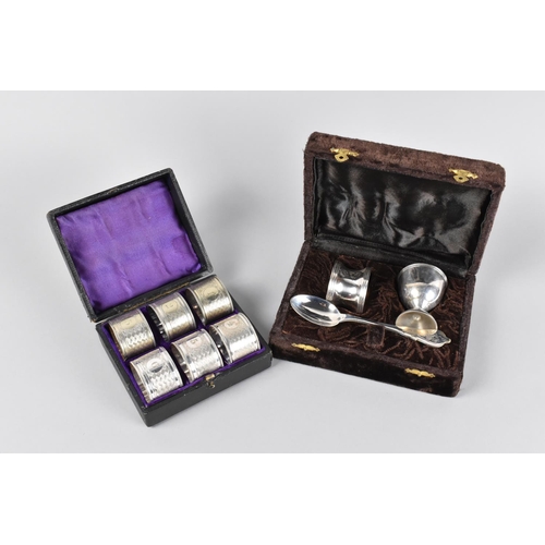 129 - A Cased and Numbered set of Six Silver Plated Napkin Rings together with a Cased Set Comprising Eggc... 