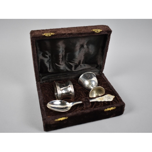 129 - A Cased and Numbered set of Six Silver Plated Napkin Rings together with a Cased Set Comprising Eggc... 