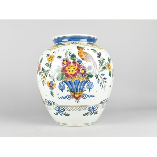 158 - A Poly Delft Vase Decorated with Bird and Flowers, 27cms High