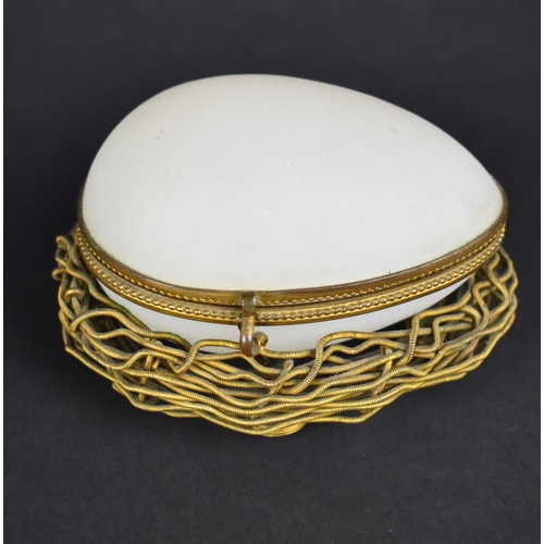 165 - A Novelty Easter Egg Box formed from Gilt Wire and Opaque Glass, 9cms Wide